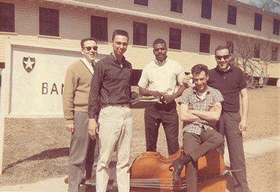 Dino Fiumara BSX bass owner sitting on his upright bass